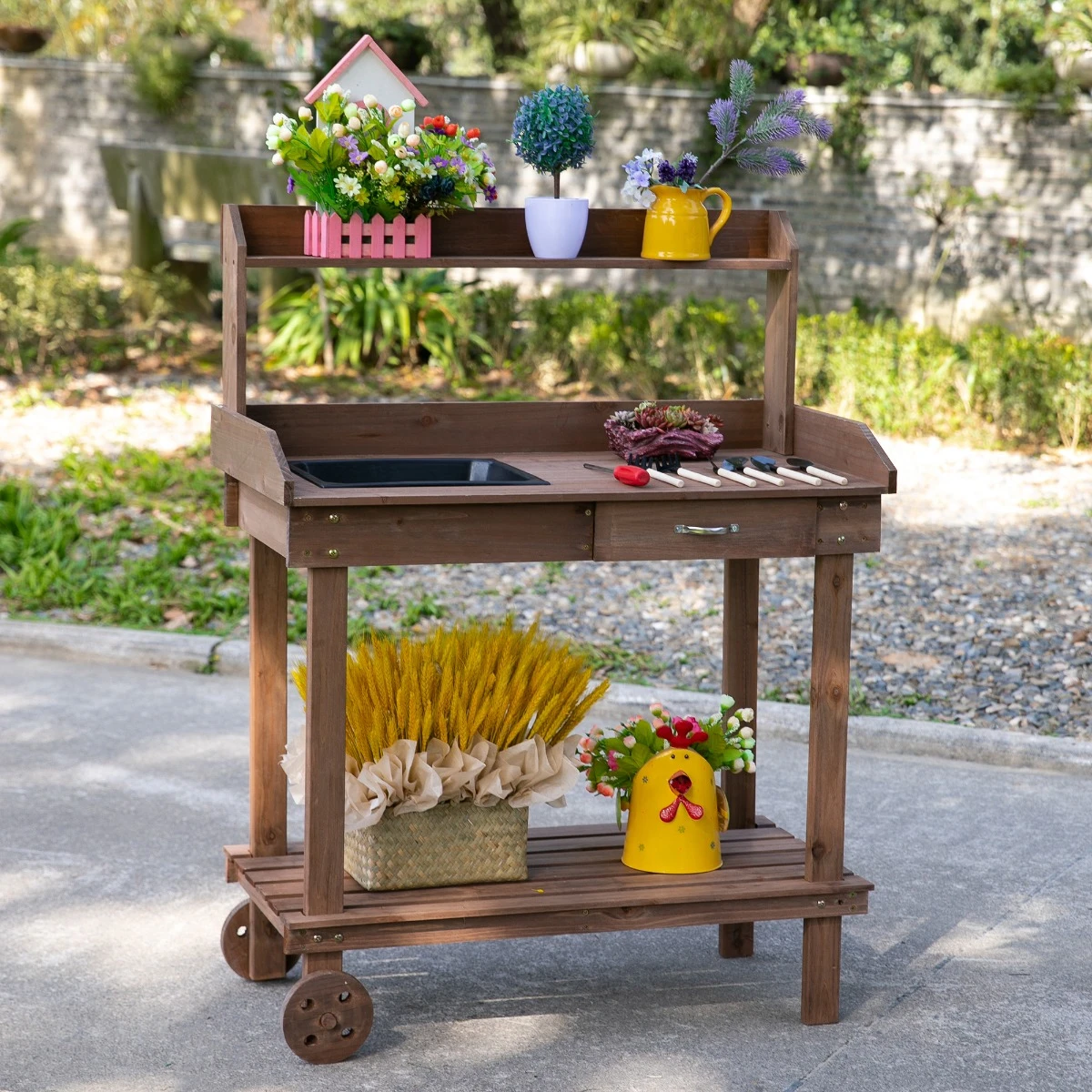 Outsunny 36'' Wooden Potting Bench Work Table With 2 Removable Wheels, Sink, Drawer & Large Storage Spaces, Brown 11 Outsunny 36'' Wooden Potting Bench Work Table With 2 Removable Wheels, Sink, Drawer & Large Storage Spaces, Brown - Image 11