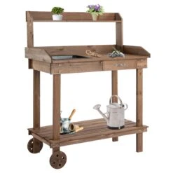 Outsunny 36'' Wooden Potting Bench Work Table With 2 Removable Wheels, Sink, Drawer & Large Storage Spaces, Brown 25 Outsunny 36'' Wooden Potting Bench Work Table With 2 Removable Wheels, Sink, Drawer & Large Storage Spaces, Brown -Outsunny ore2c117e681f8e39